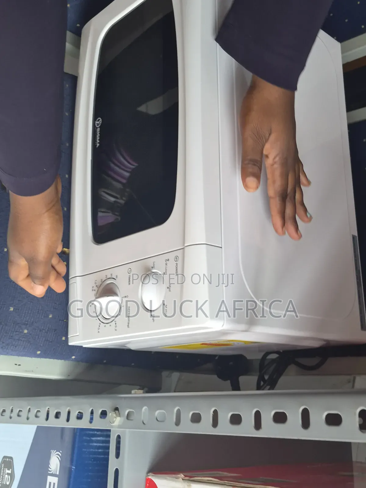 20 Liter Microwave Sigma - Quick Heating Everyday Convenience