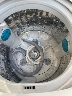 Neatly Used LG 9kg TurboDrum Washing Machine + Hoses