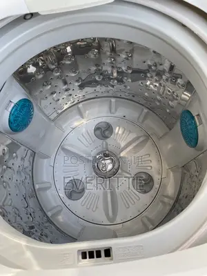 Neatly Used LG 9kg TurboDrum Washing Machine + Hoses