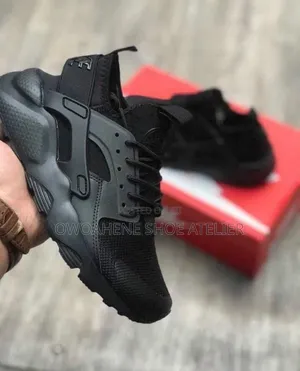 Nike Air Huarache Run Ultra "Triple Black" Sneaker,