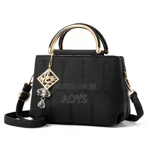 Brown Geometric Hand Bags