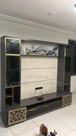 Modern Custom TV Wall Unit With Glass Cabinets and Gold Design
