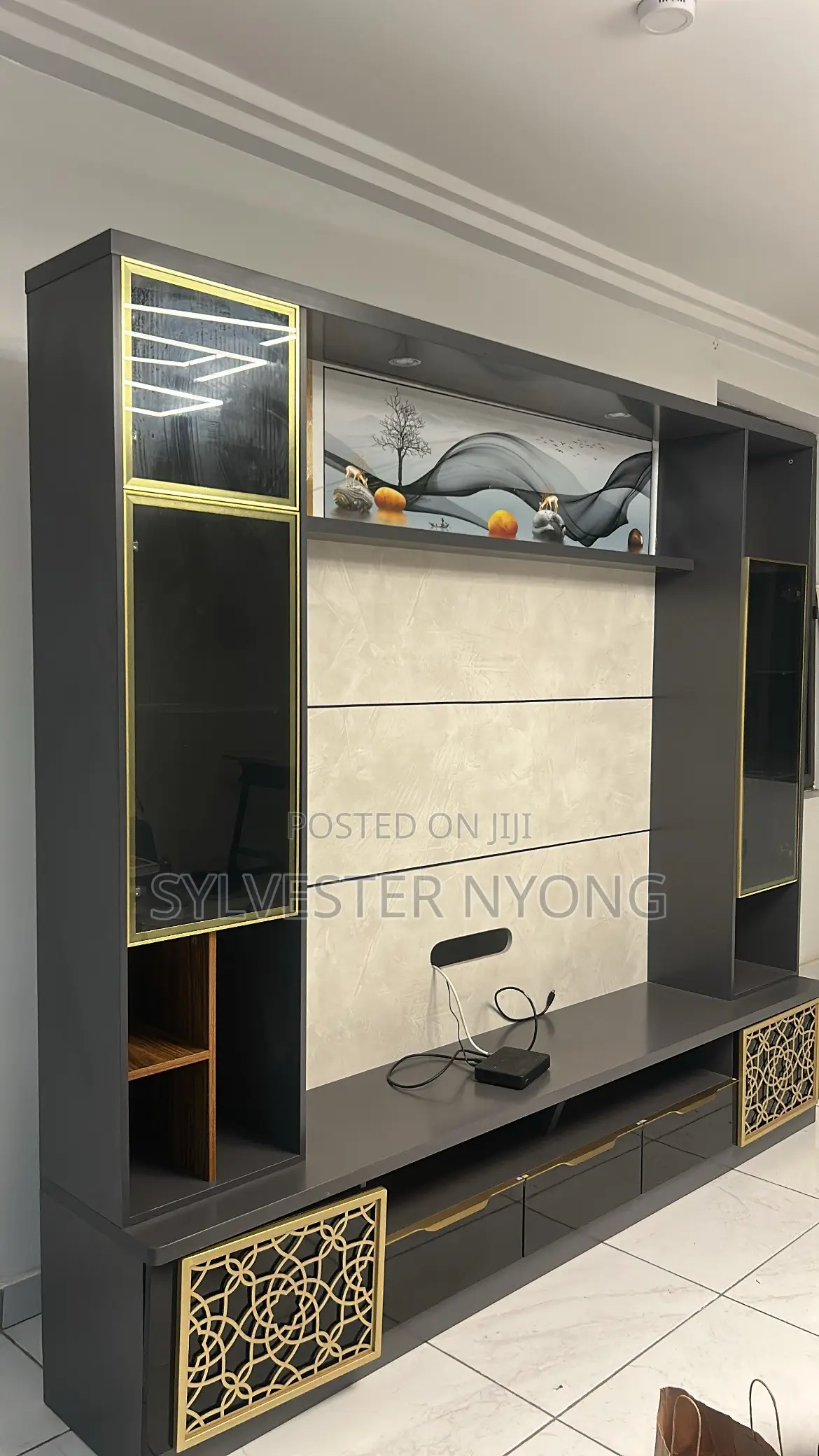 Modern Custom TV Wall Unit With Glass Cabinets and Gold Design
