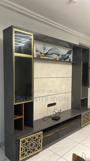Modern Custom TV Wall Unit With Glass Cabinets and Gold Design