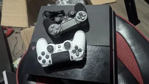 Accra Playstation 4 Standard With 2 Controllers and 8 Games + Delivery