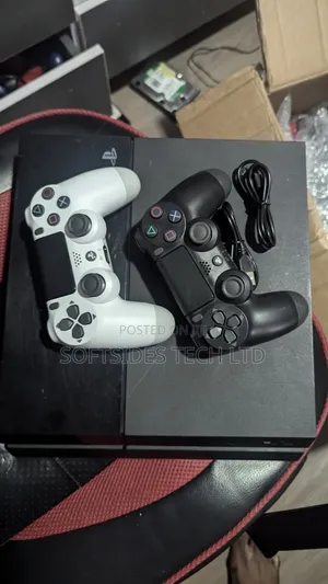 Accra Playstation 4 Standard With 2 Controllers and 8 Games + Delivery