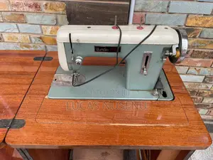 Wunder Treadle Sewing Machine With Wooden Console Cabinet
