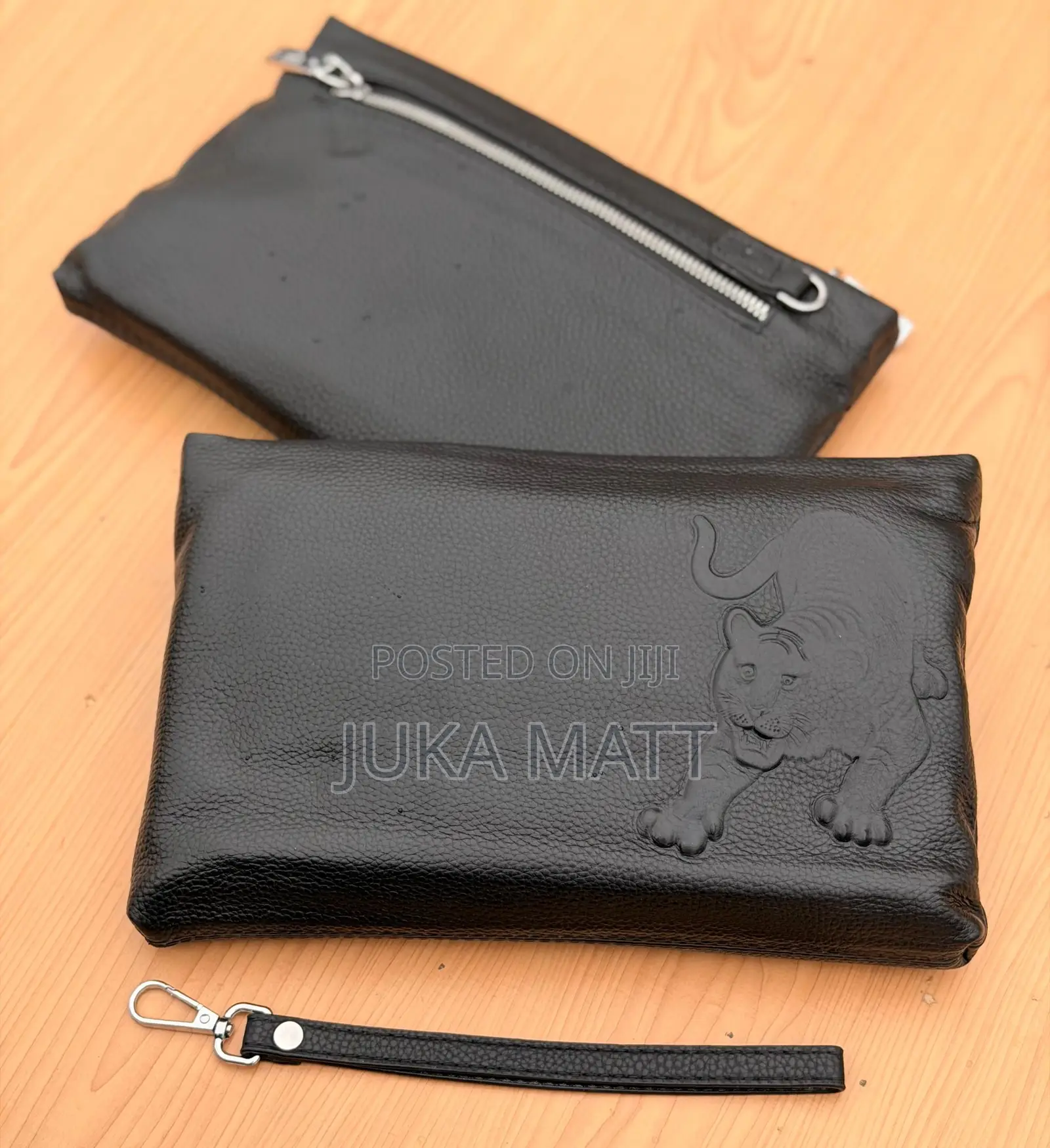 Jaguar and Other Brands Hand Pouch