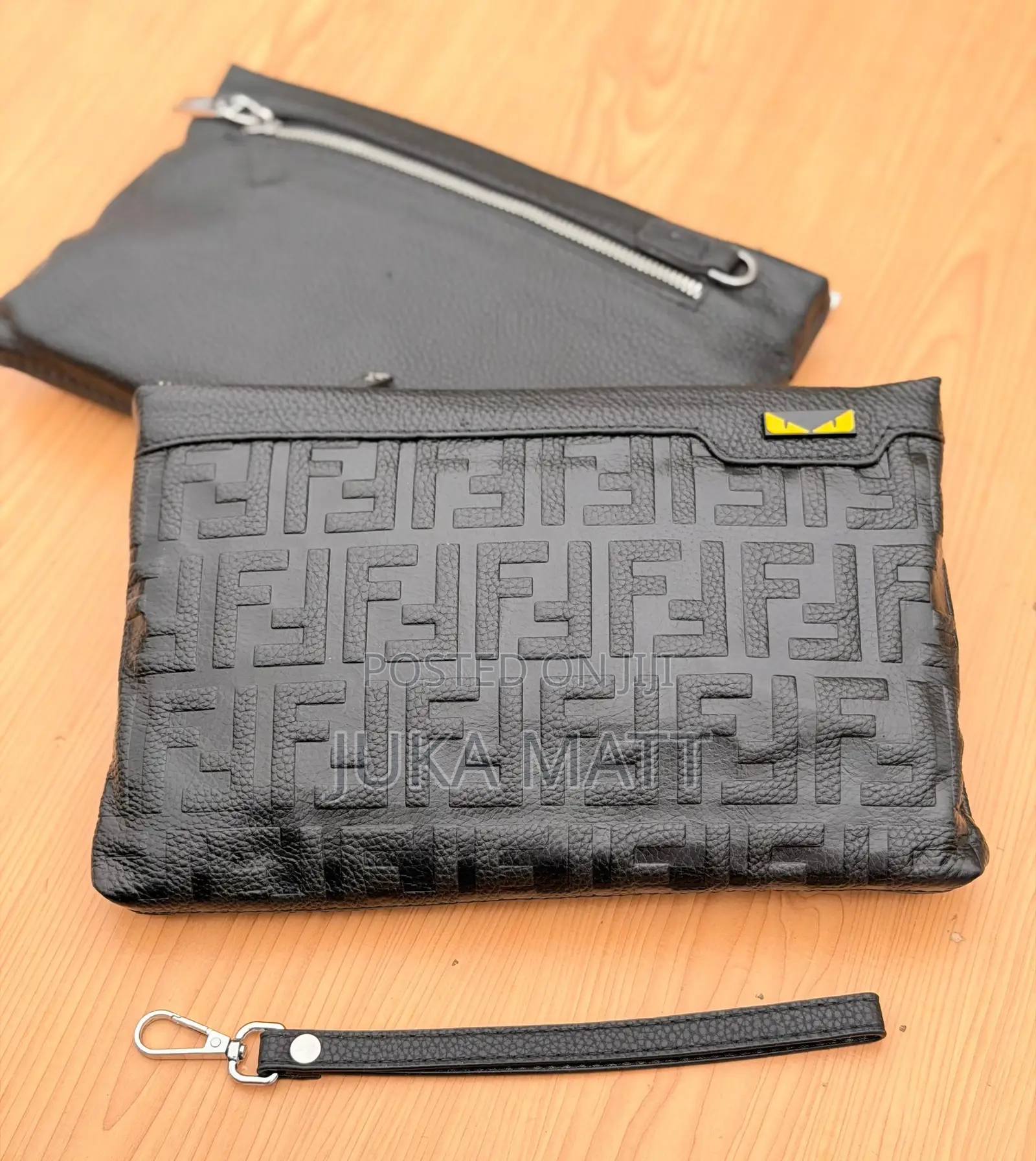 Jaguar and Other Brands Hand Pouch