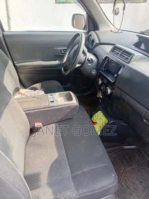 Daihatsu Cuore 2006 Brown