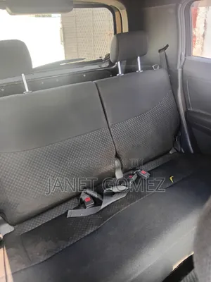 Daihatsu Cuore 2006 Brown