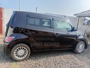 Daihatsu Cuore 2006 Brown