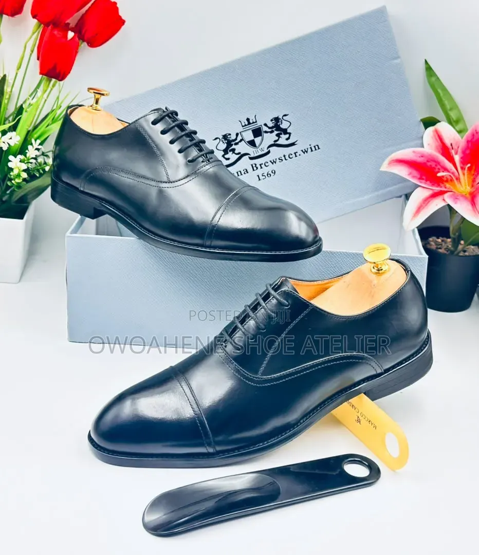 Men's Black Cap-Toe Oxford Dress Shoes.