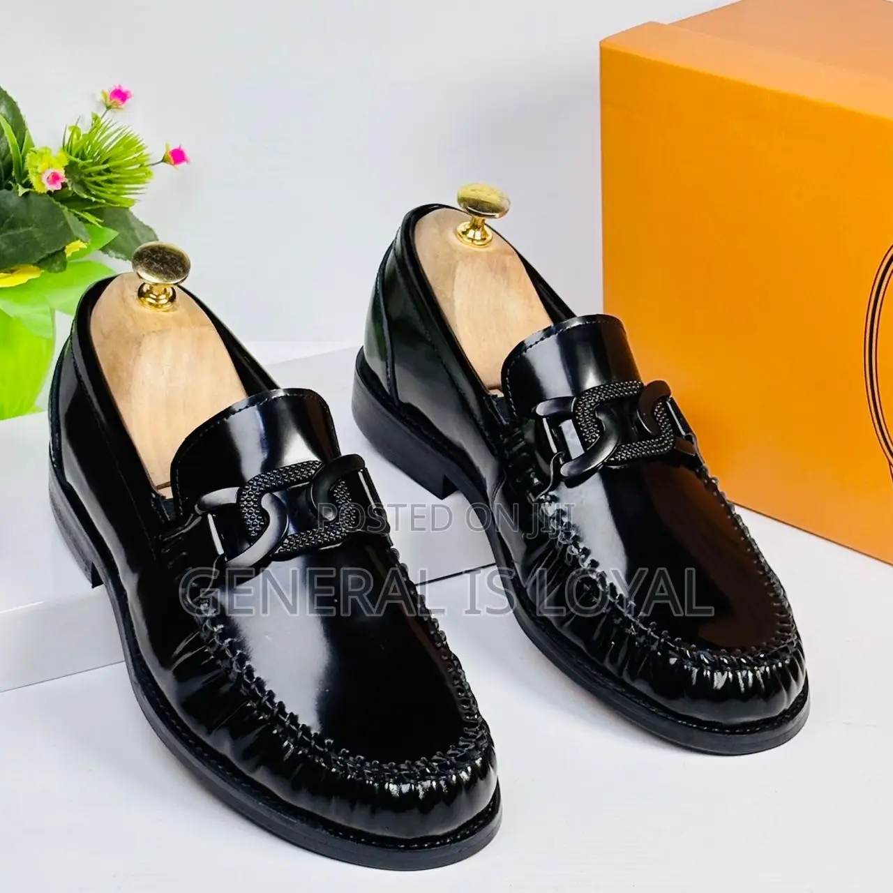 TOD’s Black Mirror Leather Loafers
