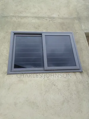 Dark Glass Sliding Window Production