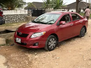 Toyota Corolla Base 4dr Sedan (1.8L 4cyl 5M) 2010 Red