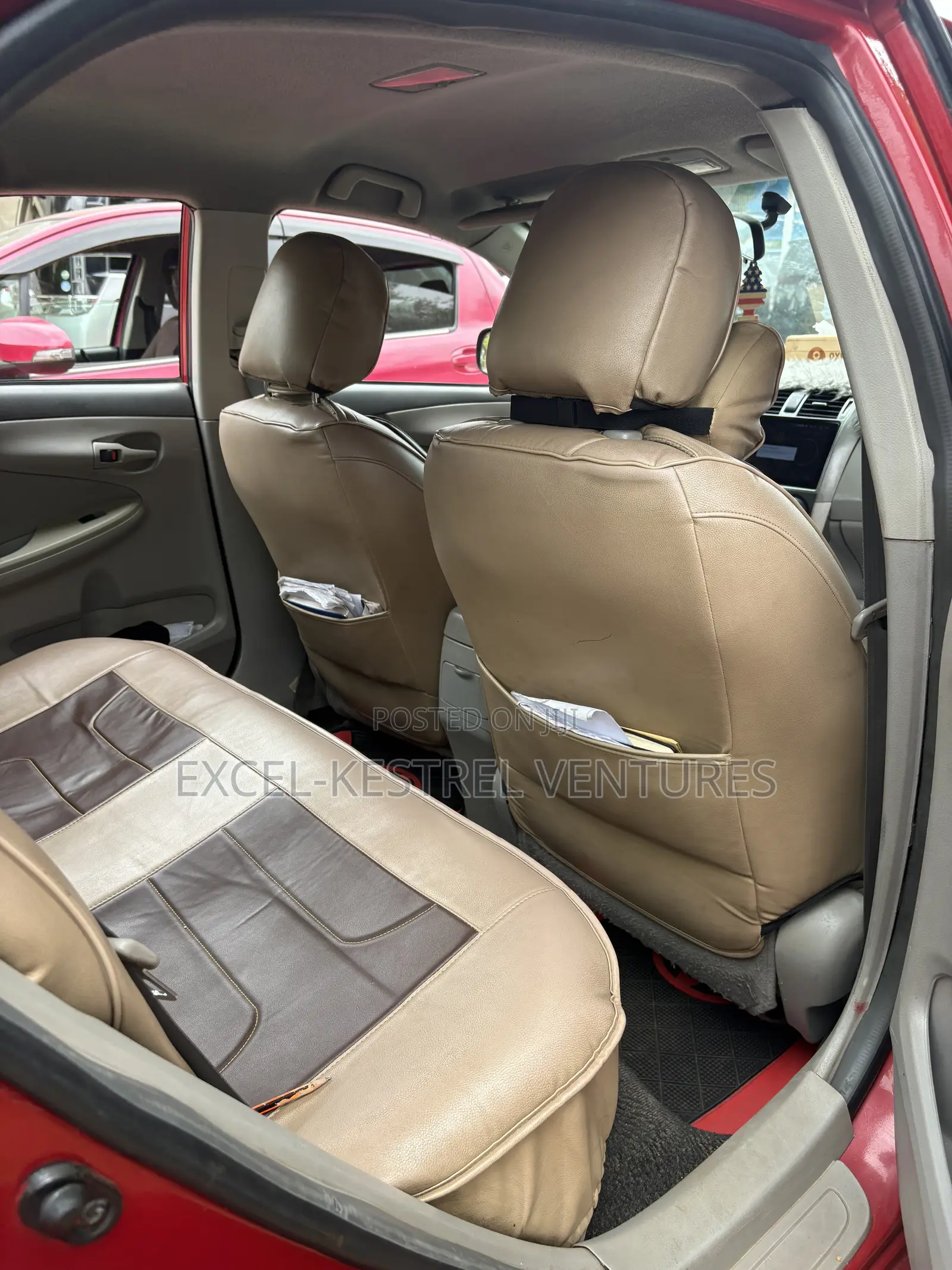 Toyota Corolla Base 4dr Sedan (1.8L 4cyl 5M) 2010 Red