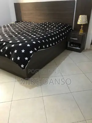 Elegant Dark Wood Bed Frame