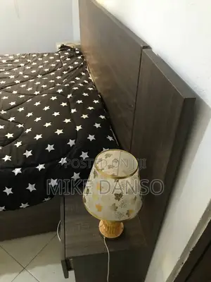 Elegant Dark Wood Bed Frame