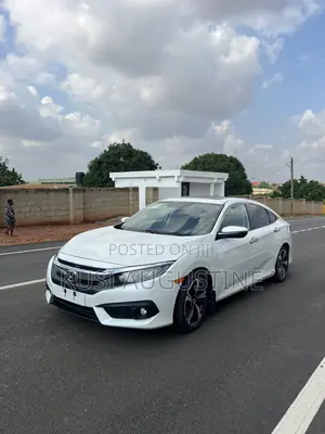 Honda Civic Touring 2dr Coupe (1.5L 4cyl) 2016 White