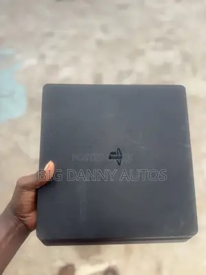 PlayStation 4 Slim With Games and Controls