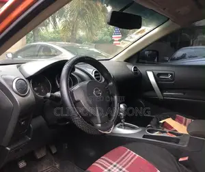 Nissan Rogue SL 2010 Orange