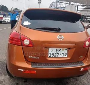 Nissan Rogue SL 2010 Orange