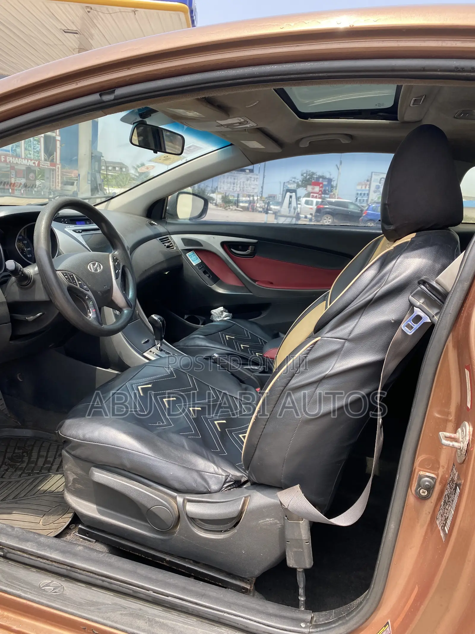 Hyundai Elantra SE Coupe FWD (1.8L 4cyl 6A) 2013 Brown