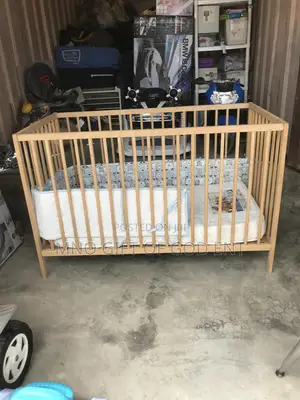 Adjustable Baby’S Wooden Cot From U.S.