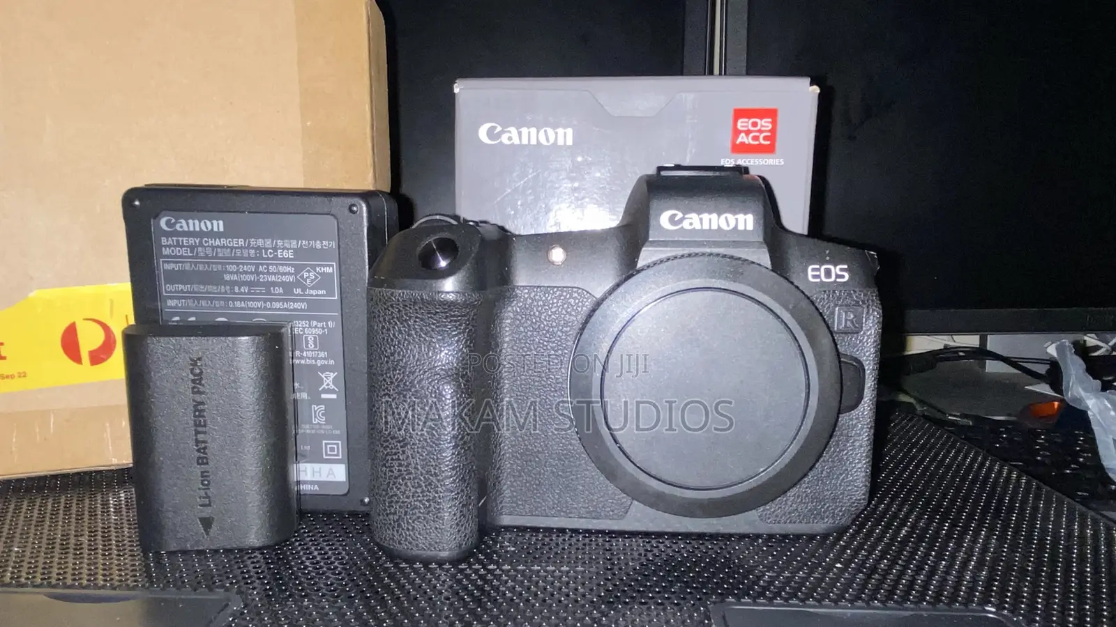 Canon R 99% New With EF Adapter