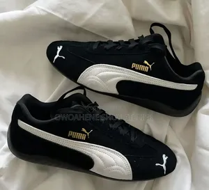 Pair of Puma Speedcat OG Sneakers