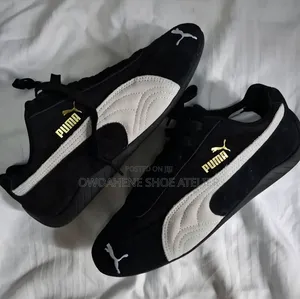 Pair of Puma Speedcat OG Sneakers