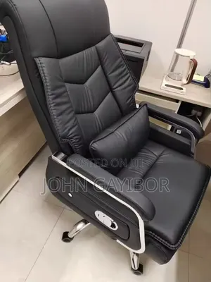 Ergonomic Swivel Chair With 7-Point Massage Function and Lumbar Pillow