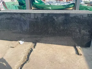 It’s Black Granite 
Size-285cmx84cm(9ft by 2ft)