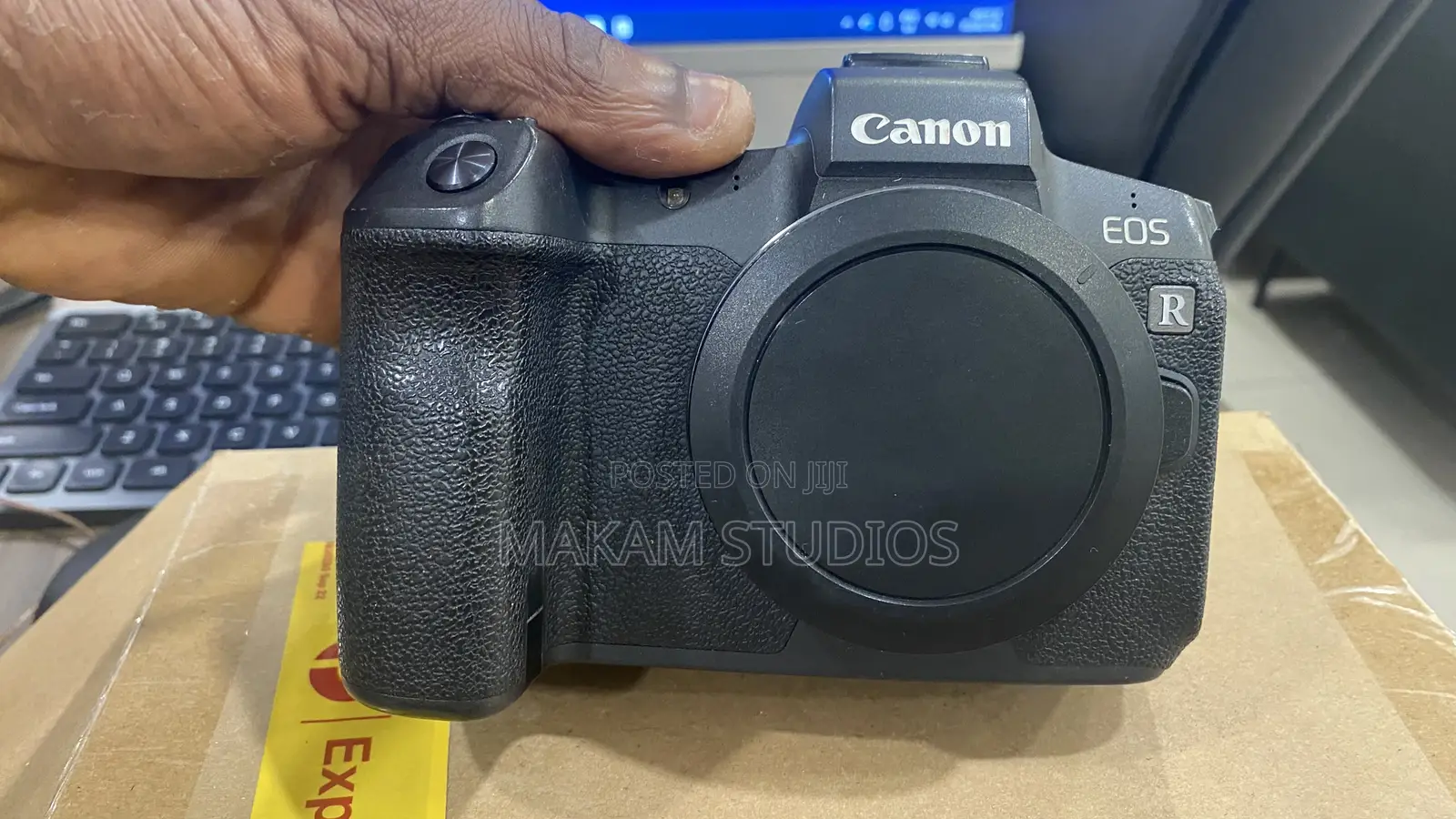 Canon R 99% New With EF Adapter