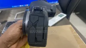 Canon R 99% New With EF Adapter