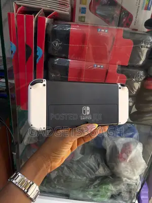 Nintendo Switch OLED (64GB + Games)