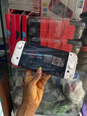 Nintendo Switch OLED (64GB + Games)