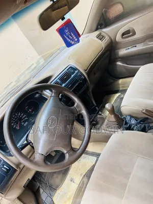 Toyota Corolla 1.6 Sedan 1997 Gold