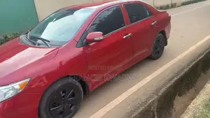 Toyota Corolla LE 4dr Sedan (1.8L 4cyl 4A) 2010 Red
