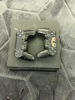 Ps4 Slim 1 TB With 2 Controllers and With FIFA 19 Installed.