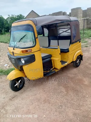 Bajaj RE 2024 Yellow