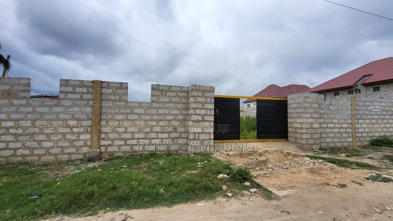 One and Half Plots of Land.