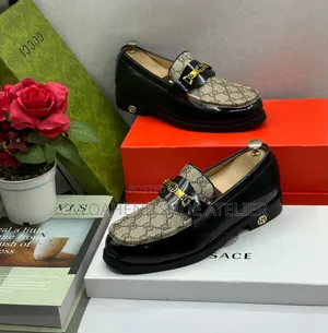 Gucci Cara Logo Canvas and Patent Leather Loafers