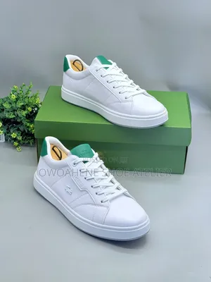 Lacoste Court Ace Leather Sneakers.