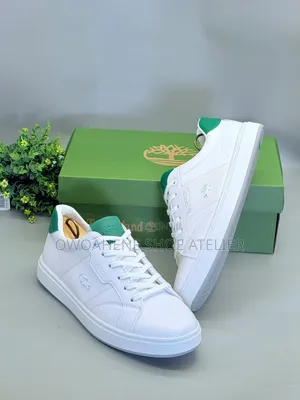 Lacoste Court Ace Leather Sneakers.
