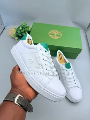 Lacoste Court Ace Leather Sneakers.