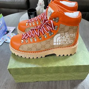 The North Face X Gucci Boots