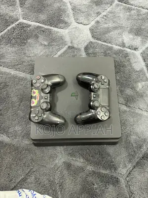 Ps4 Slim 1 TB With 2 Controllers and With FIFA 19 Installed.