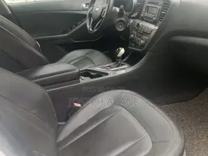 Kia Optima LX Sedan FWD (2.4L 4cyl 5M) 2010 White